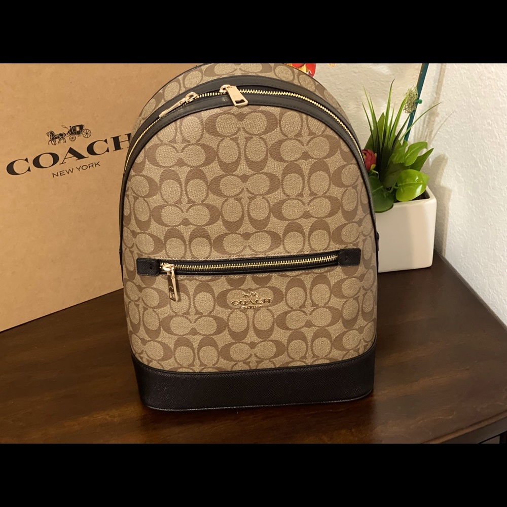 NWT Coach Signature Kenley Backpack Khaki Black. AUTHENTICITY GUARANTEE